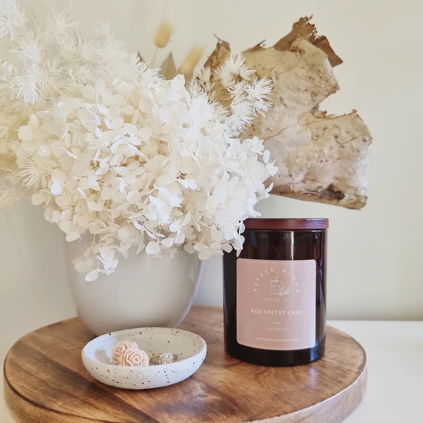 Candle Sitting on table with flowers luxury